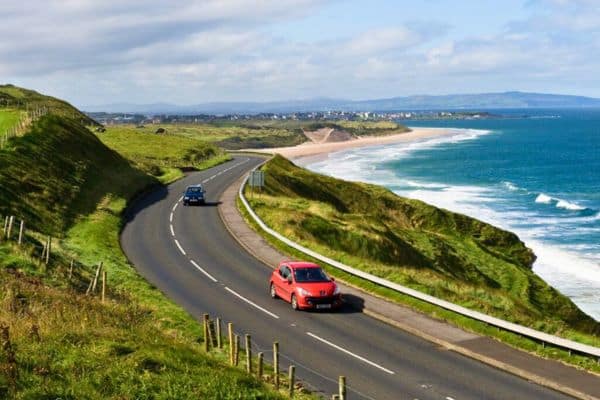 Scenic Ireland self-drive tour photo featuring a coastal road with stunning landscapes
